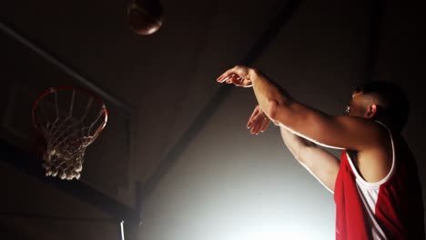 sportsman playing basketball