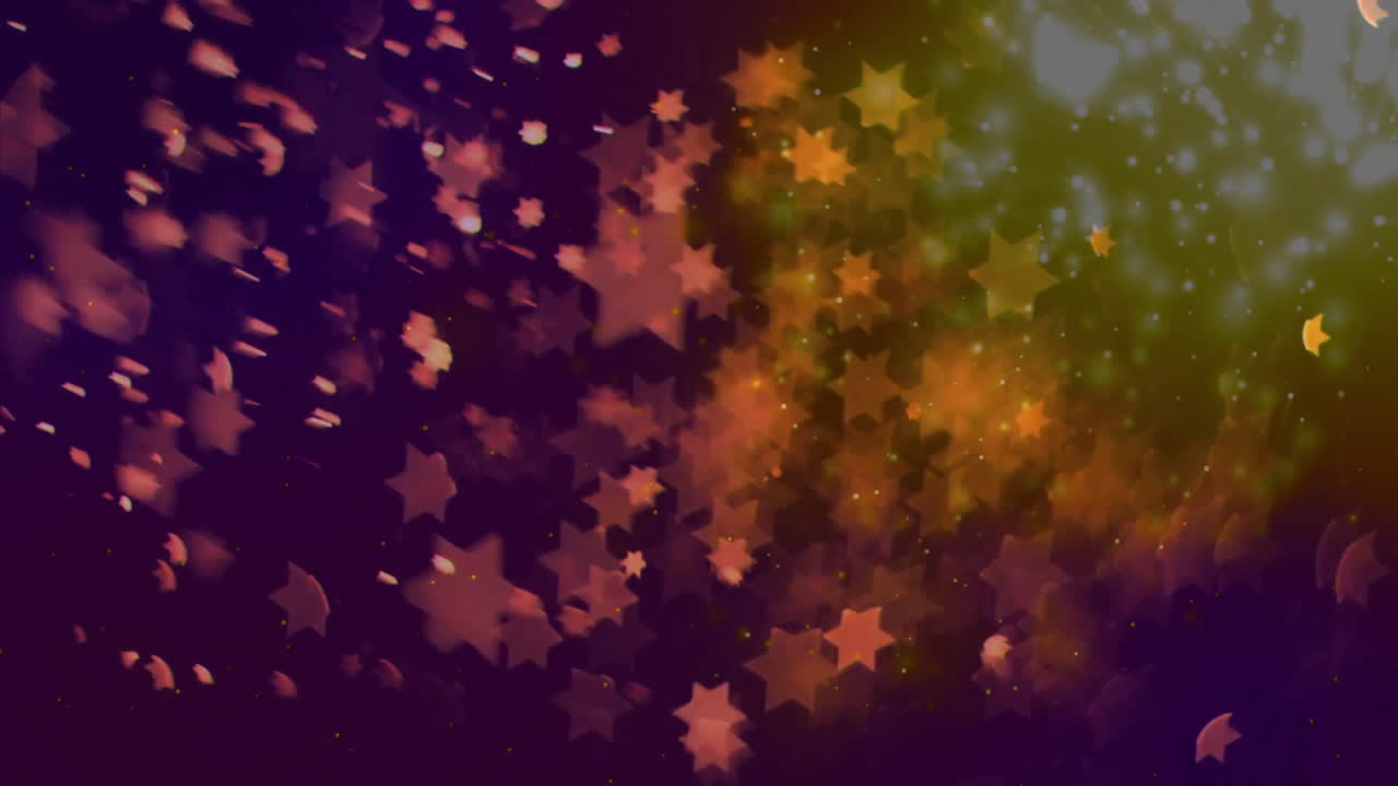 estrellas coloridas y chispas que se mueven sobre el fondo oscuro