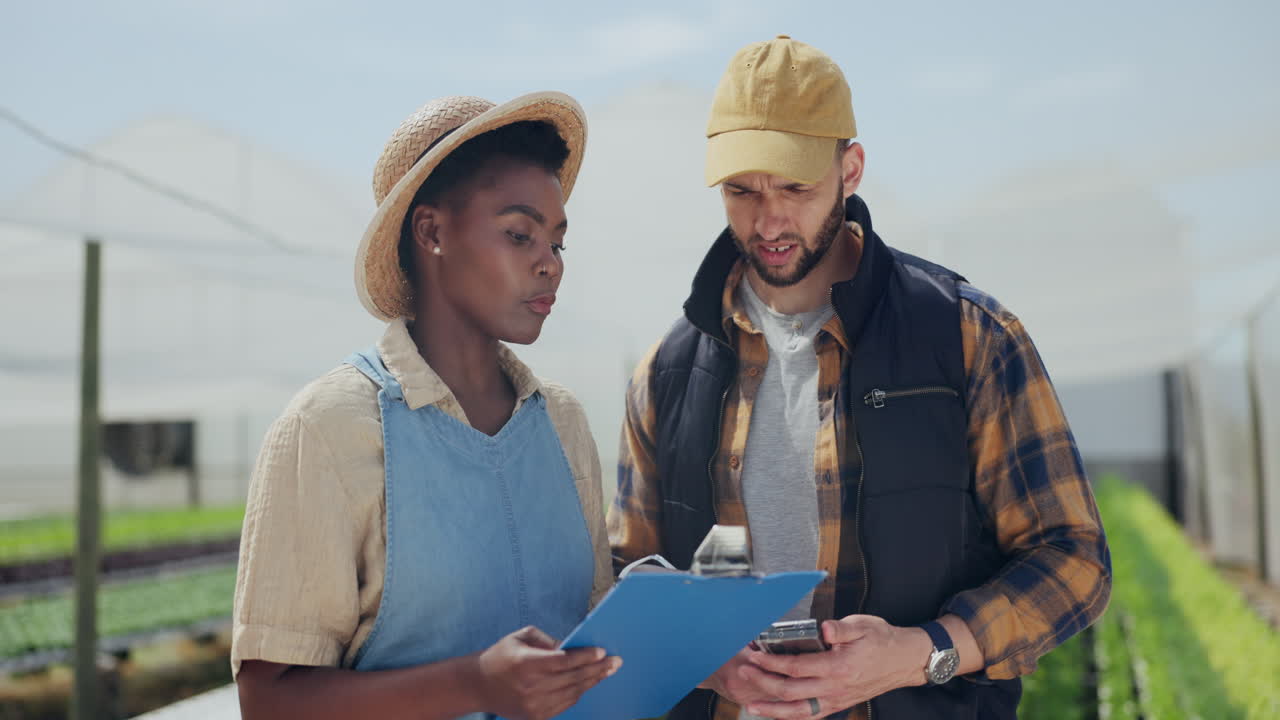 Farm Workers Discussing Crop Checklist