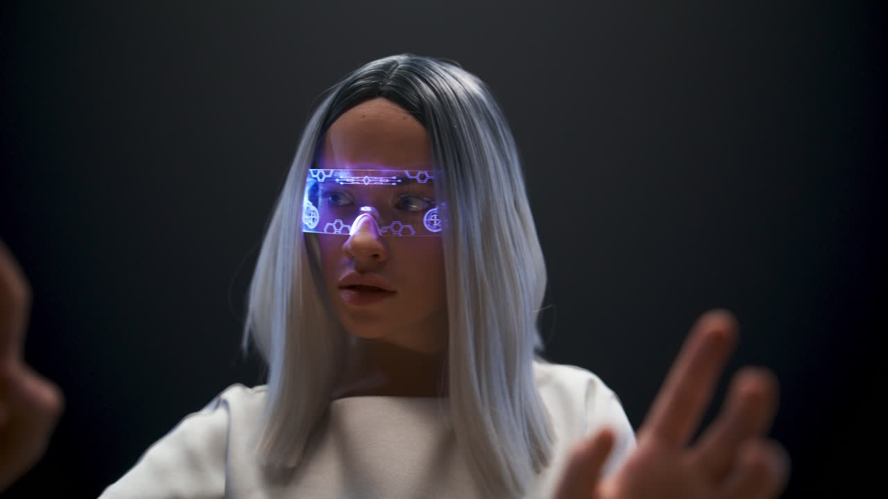 Inspection girl hands swiping invisible virtual images in transparent glasses