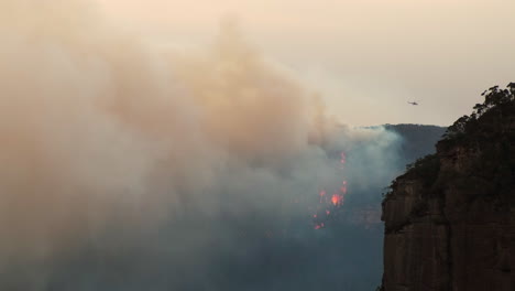 Firefighting-helicopter-with-extreme-smoke-and-visible-flames