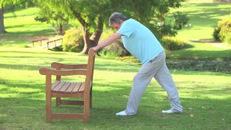 Mature-man-doing-his-stretches-outdoors