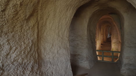 Piusa-Caves-Estonia,-Ancient-Mineral-Sandstone-Narrow-Caves-Grotto,-Underground-Cavern-Aisles-Corridors-and-Arcs,-Nature-Reserve-Gallery-Tunnel,-Touristic-Attraction