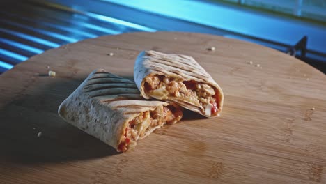 Prepared-Chicken-And-Egg-Tortilla-On-Wooden-Board