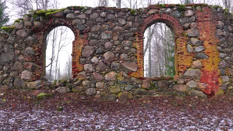 Old-abandoned-church-remains-cultural-heritage,-forgotten-building-in-forest