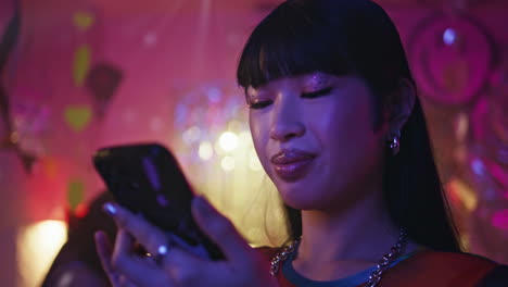 girl making selfie nightclub at glittery event closeup. woman
