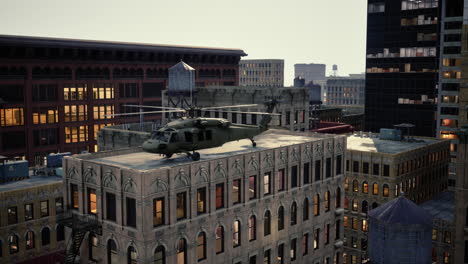 helicopter on rooftop of city buildings