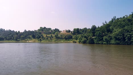 Fabulous-view-of-Tikkar-Taal-lake-surrounded-by-mountains-on-the-sunny-day