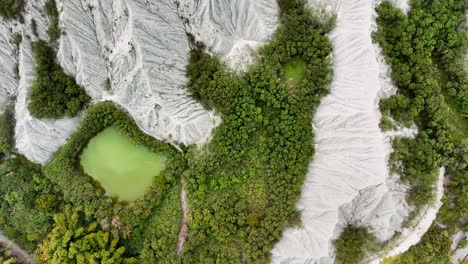 Aerial-top-down-shot-of-Lunar-Landscape-and-Lake-in-Tianliao-District,-Kaohsiung,-Taiwan-田寮月世??