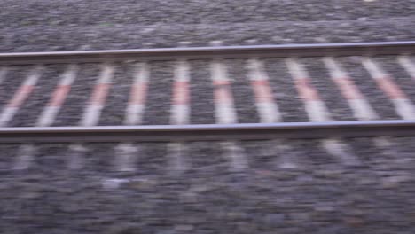 the line next to the fast moving train