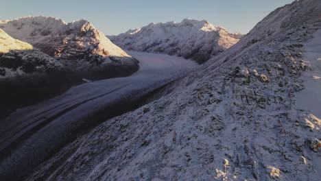 Aerial-View-of-Aletsch-Glacier-in-Swiss-Alps-at-Sunrise,-Canton-Valais-Region-in-Switzerland