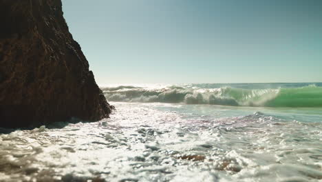 waves crashing on a rocky beach
