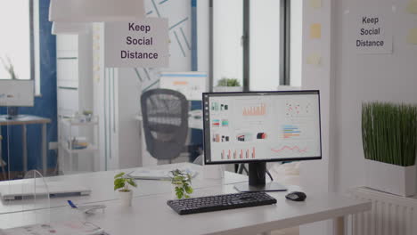 Modern-empty-office-interior-with-plastic-separators-and-keep-social-distance-poster