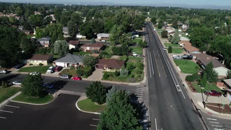 suburban urban city street drone flight with cars