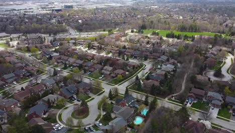 aerial shot flying over an overcast oakville neighborhood