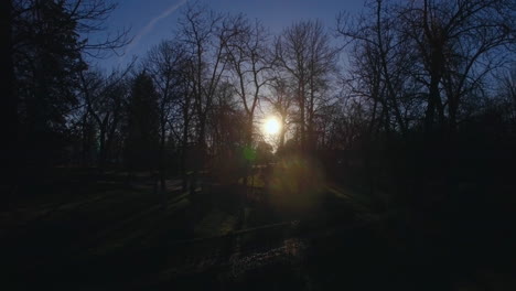 Aerial-view-of-sun-shining-over-Buen-Retiro-Park-in-Madrid