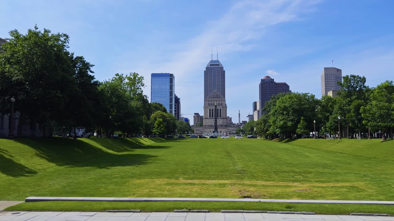 Panorama of American Legion Mall's open green space in summer light, establishing pan