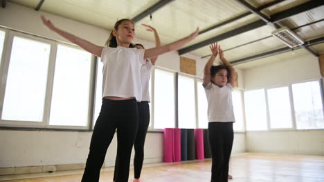 Teacher-and-pupils-in-dance-class