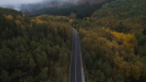 scenic aerial view over alpine loop highway valley in fall and cloudy day