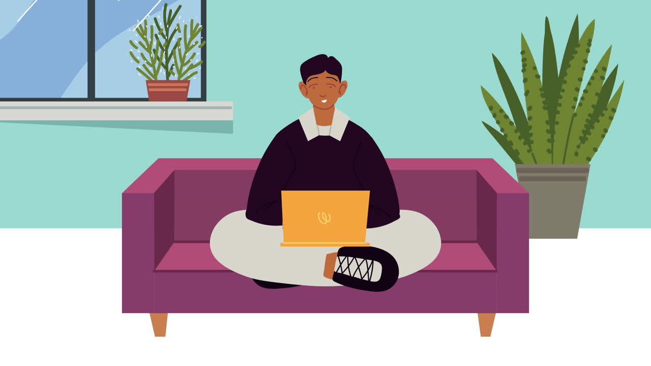 소파 에 앉아 있는 노트북 을 사용하는 젊은 남자