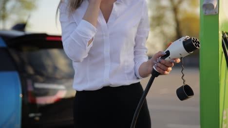 close up of electric car charging