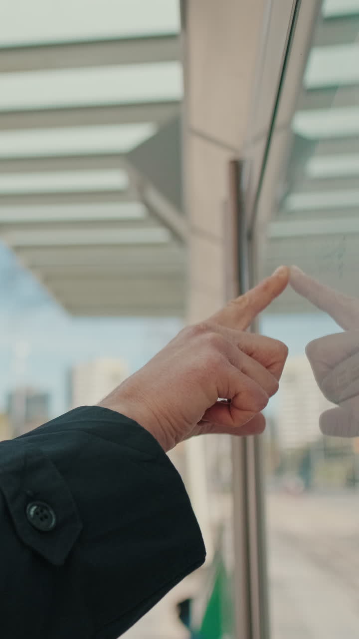 Businessman Uses Interactive Display in the City