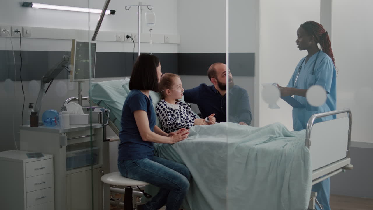 African american pediatric asisstant monitoring sick child discussing recovery treatment