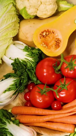 assorted vegetables arranged neatly on wooden surface