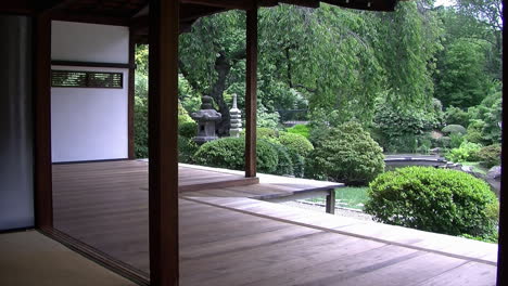 view of japanese garden from interior of house