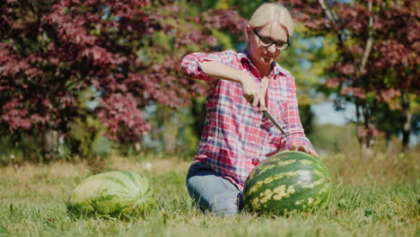 woman carving watermelons