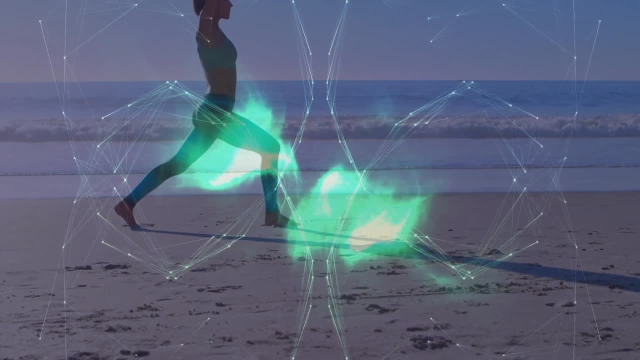 Fitness instructor planting foot on beach sand activating wireframe globe into glowing energy wings