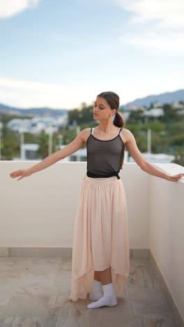 ballet dancer on balcony