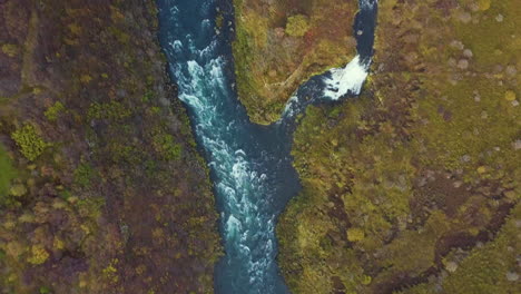 Top-down-aerial-view-of-the-river-and-Faxi-Falls-in-Iceland