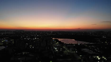 aerial view of chennai,india with orange skies. follow shot