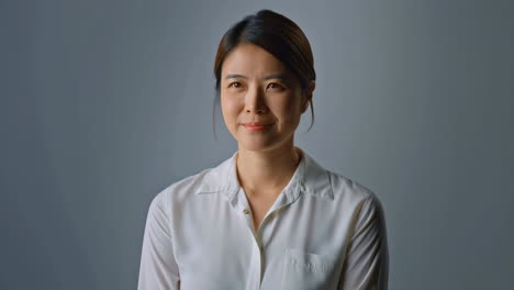 portrait of a pensive asian woman