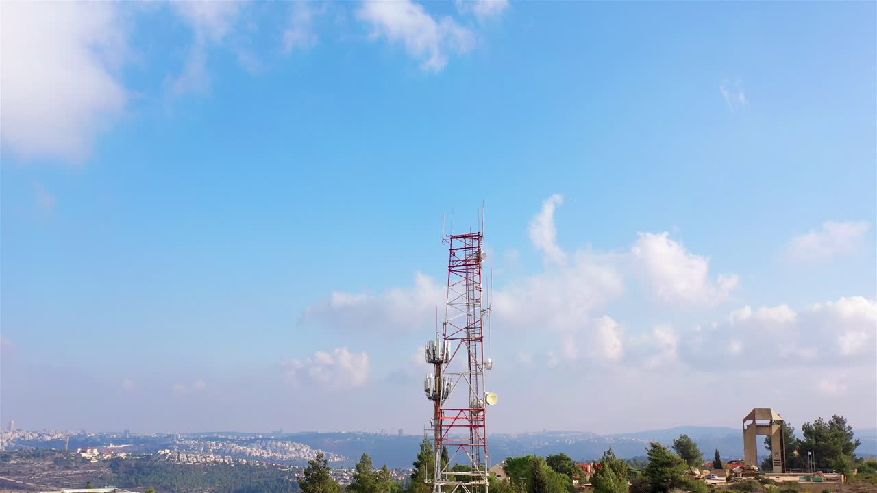 Communication Tower Over Cityscape