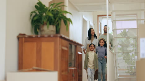 Parents,-children-and-front-door-at-new-home