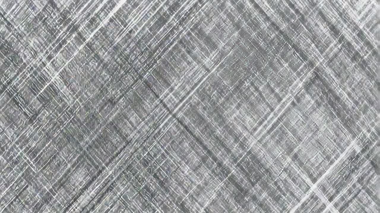 Crosshatched gray texture remaining fixed on frame, displaying uniform diagonal lines