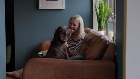 woman and dog at home