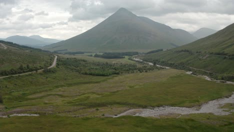 rising establishing shot of mountains in the scottish highlands