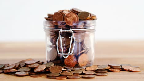 close-up of coins in bottle