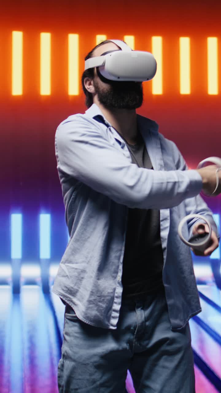 Vertical Video Artsy young guy immersed in virtual reality under neon lights and cyberpunk glow