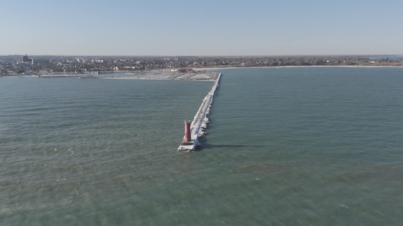 Aerial view of the lighthouse in Sheboygan WI on a calm day with little waves from Lake Michigan