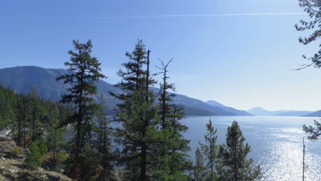 beautiful lake surrounded by rocky mountain range 4k