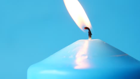 burning blue candle