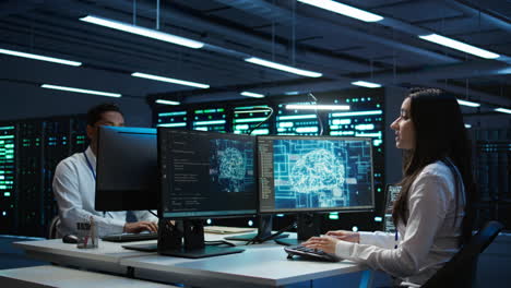 technicians coworkers using ai tech on computer to do data center checkup
