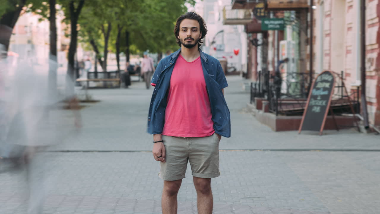 Man Standing on City Street