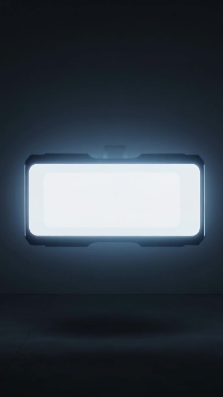 Vertical video: Starting frames showing panel glowing and flickering on dark wall with halo bezel