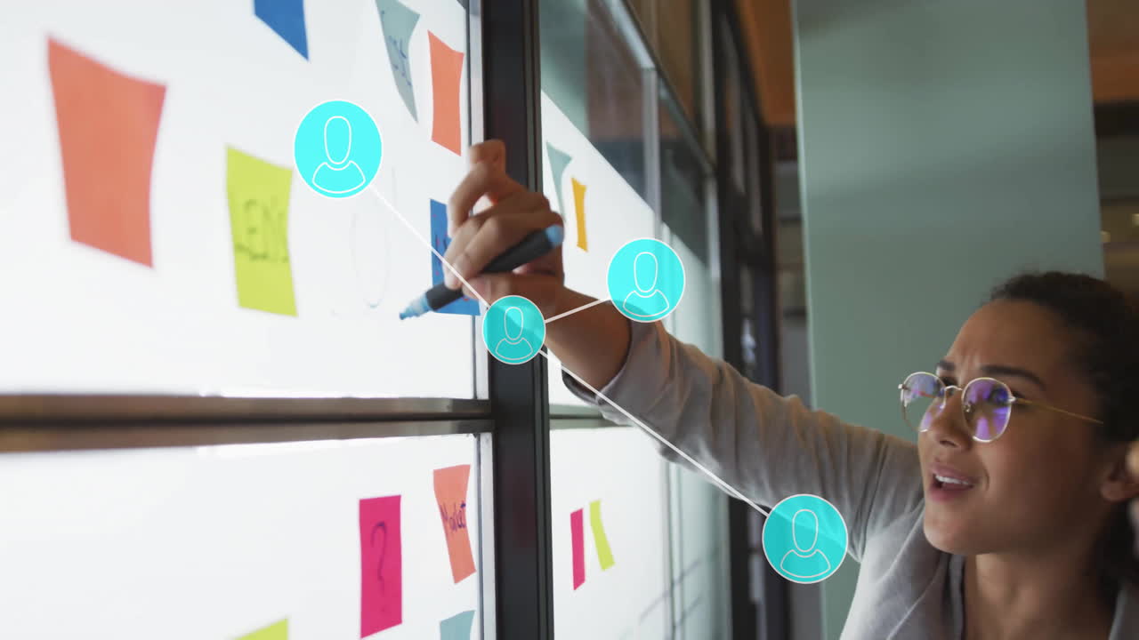 Person writing on glass wall with connected user icons animation over sticky notes