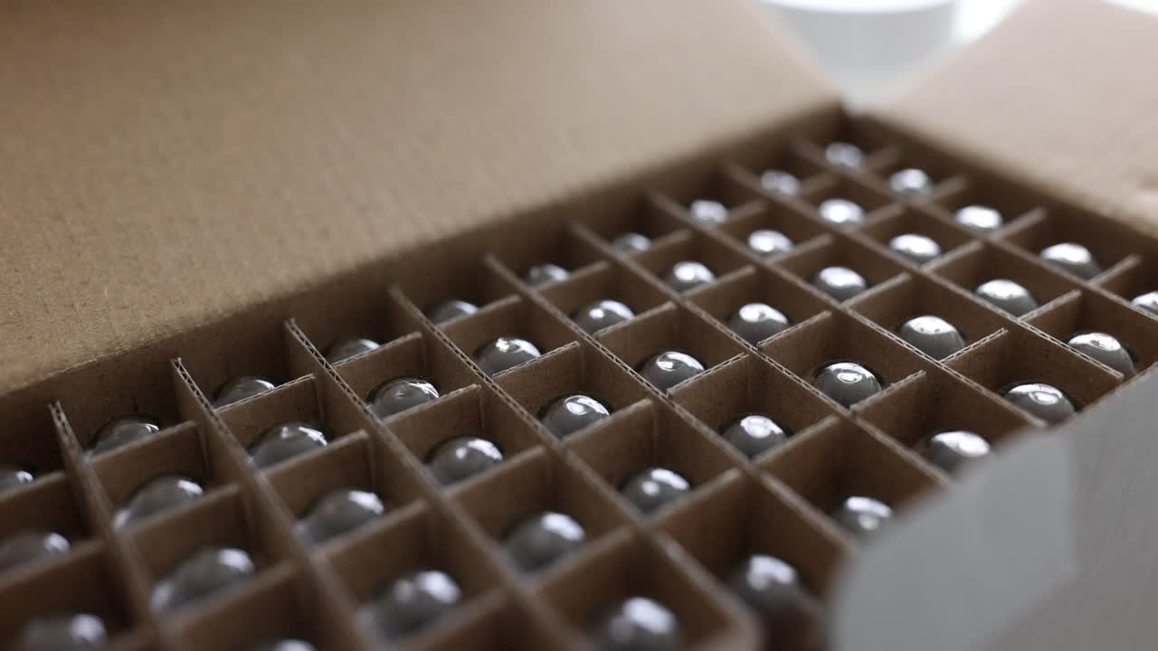 Glass spheres packed in a cardboard box